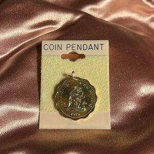 Ten cent coin pendant from the Bahamas.